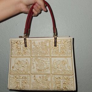 Embroidered red and white bag.